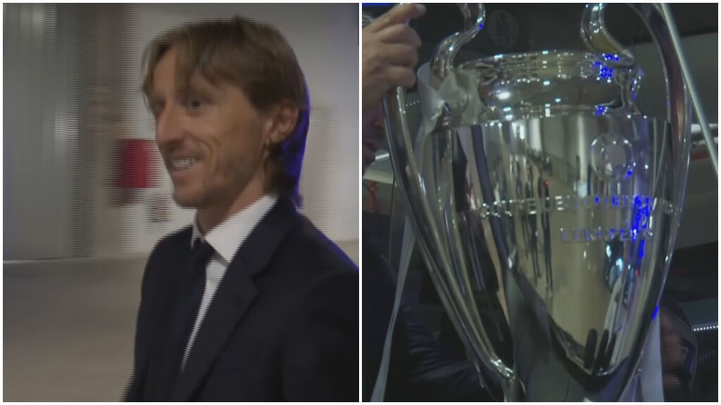 Luka Modric y la copa de la Champions League suben al autobús para la celebración del Real Madrid