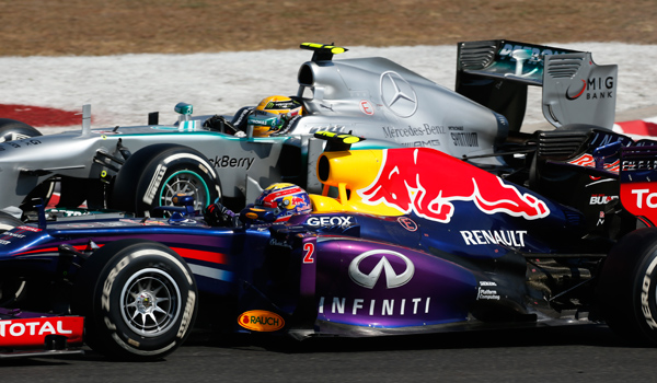 Vettel y Hamilton, en acción.