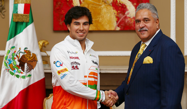 Sergio Pérez y el dueño de Force India.