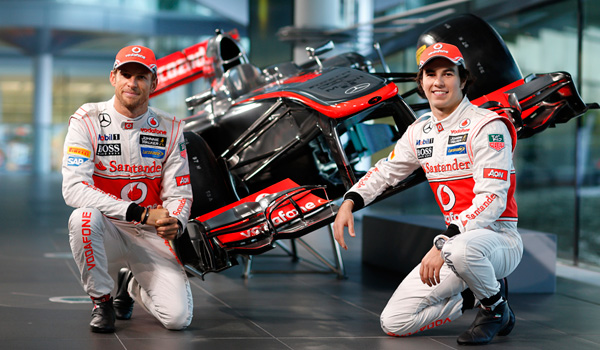 Button y Pérez con el MP4-28.