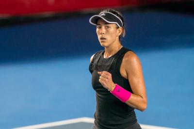 Garbiñe Muguruza celebra su victoria. 
