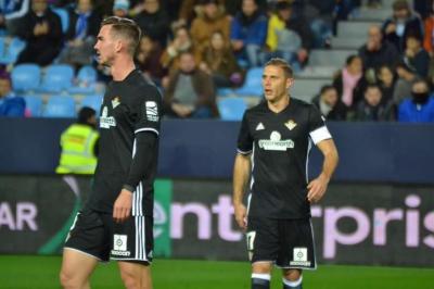 Fabián, con Joaquín en La Rosaleda.