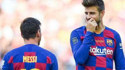 Piqué y Messi, durante un encuentro esta temporada.