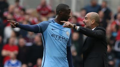 Yaya Touré y Guardiola en un partido con el City