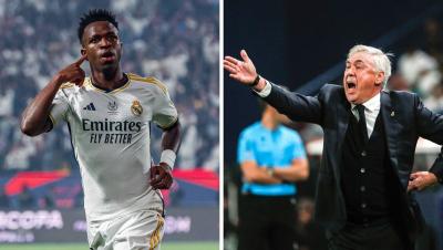 Vinicius Jr. y Carlo Ancelotti, durante el Clásico Real Madrid-Barcelona (Foto: EFE).