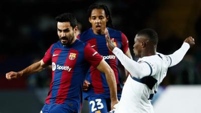 Koundé y Gündogan en el partido contra el PSG (Europa Press)