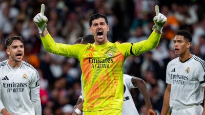 Courtois celebra una parada ante el Arsenal (Cordon Press)
