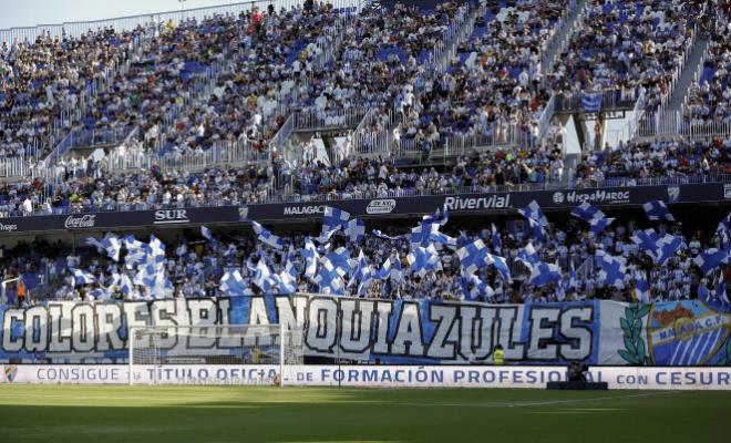 La afición del Málaga, durante un partido.