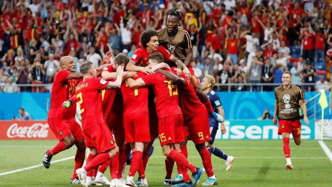 Los jugadores belgas celebran un tanto frente a Japón.