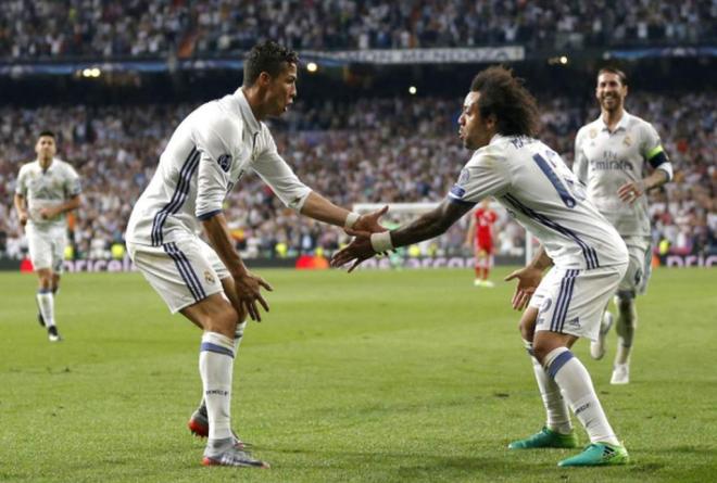 Cristiano un gol junto a Marcelo en su etapa en el Real Madrid.