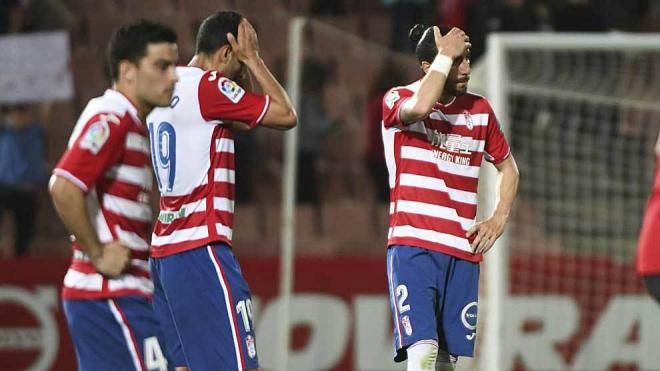 Salvador Agra y Chico Flores se lamentan tras un partido con el Granada.