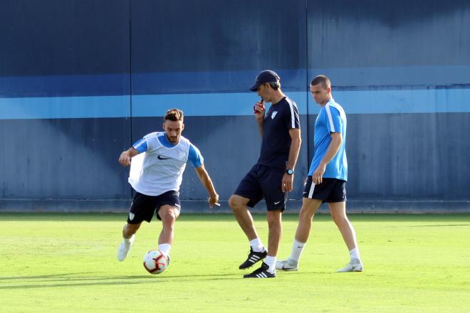 Haksabanovic y Muñiz, en un entrenamiento, con Harper al fondo.