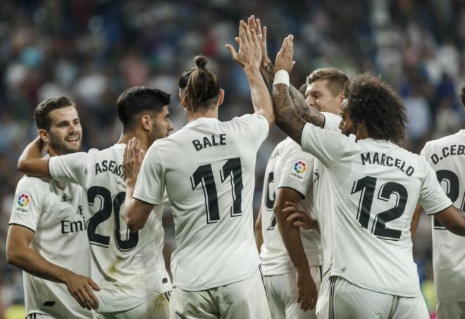 Los jugadores del Real Madrid celebran la victoria ante el Getafe por dos tantos a cero, obras de Carvajal y Bale.