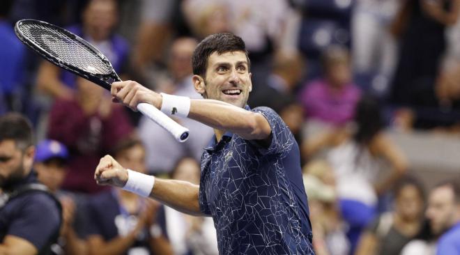 El tenista serbio Novak Djokovic celebra su victoria ante Nishikori en las semifinales del US Open.