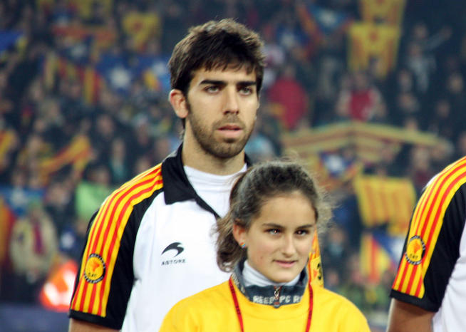 Oleguer, en un partido con Cataluña.