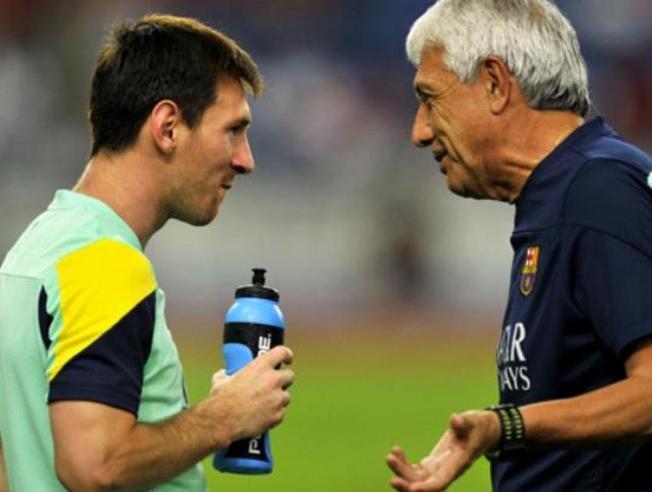 Paolorosso junto a Leo Messi.