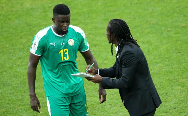 Aliou Cissé y N'Diaye, durante un encuentro.
