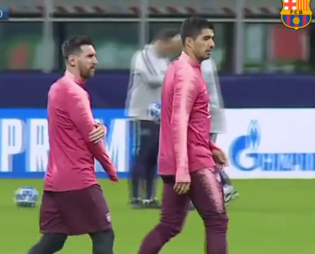 Messi, junto a Luis Suárez.