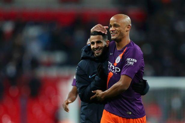 Kompany y Mahrez.