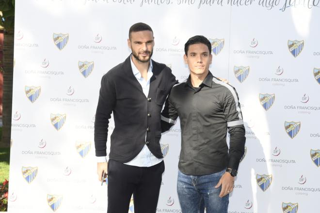 Lombán junto a Renato en la comida de Navidad del Málaga.