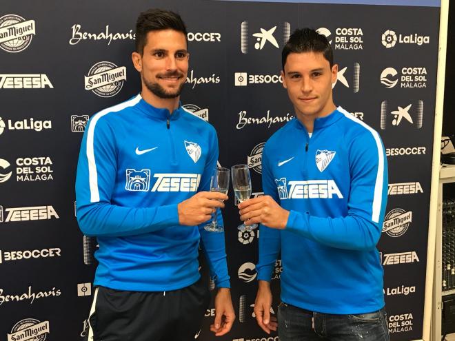 Adrián y Ricca, brindando con la prensa por un buen 2019.