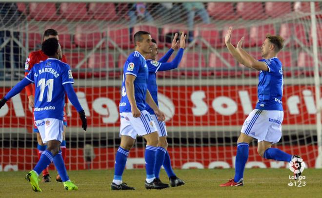 Carlos Hernández celebra su gol ante el Numancia con Tejera y Christian (Foto: LaLiga).