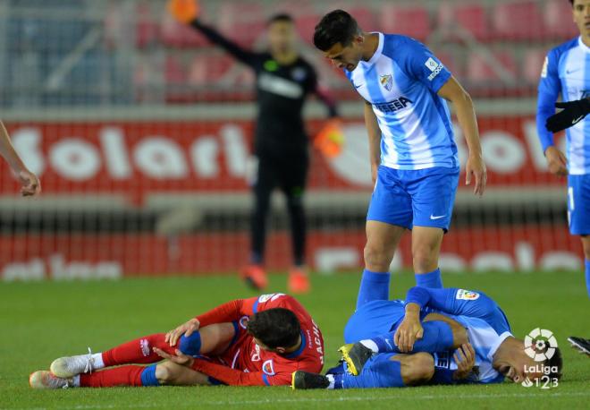 Luis Hernández recrimina a un rival una entrada a Iván Rodríguez (Foto: LaLiga).
