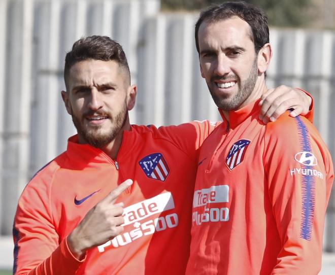 Koke y Godín, en una sesión con el Atlético (Foto: ATM).