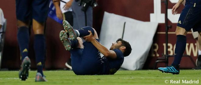 Marco Asensio cae lesionado ante el Arsenal (Foto: Real Madrid).