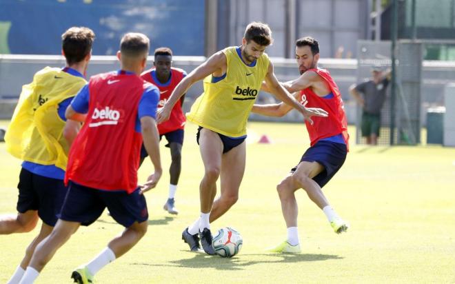 Piqué y Busquets, durante una sesión (Foto: FCB).