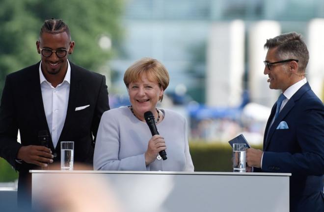 Jerome Boateng, en una recepción con Angela Merkel.