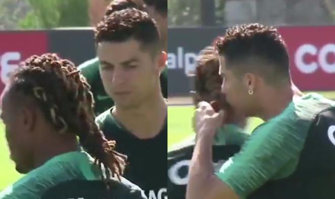 Cristiano Ronaldo le huele el pelo a Renato Sanches durante el entrenamiento de Portugal.