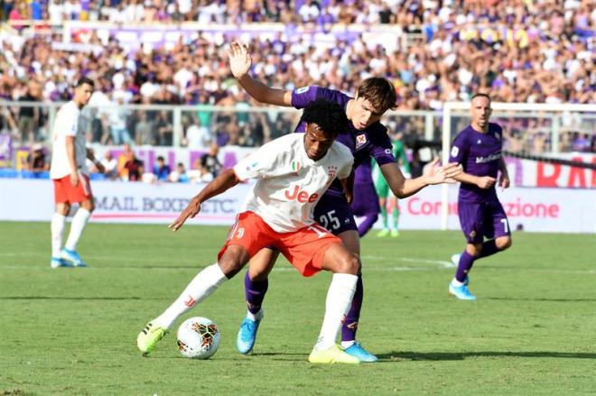 Cuadrado y Chiesa, durante el encuentro.