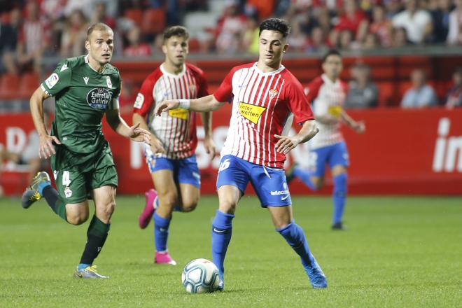 Manu García y Álex Bergantiños, durante el Sporting-Dépor (Foto: Luis Manso).