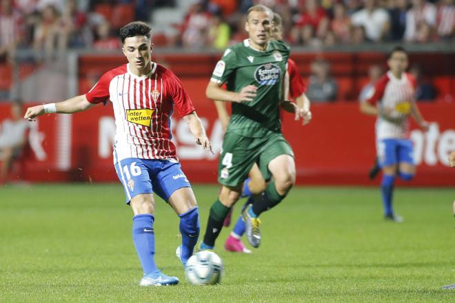 Manu García y Álex Bergantiños, durante el Sporting-Dépor (Foto: Luis Manso).