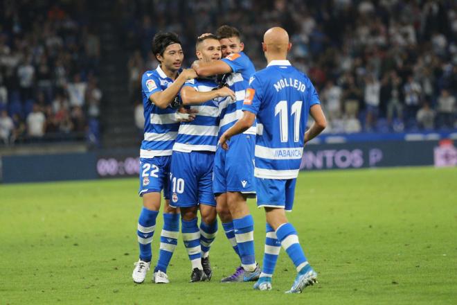 Mollejo y Gaku Shibasaki celebran el gol de Aketxe con el Numancia.