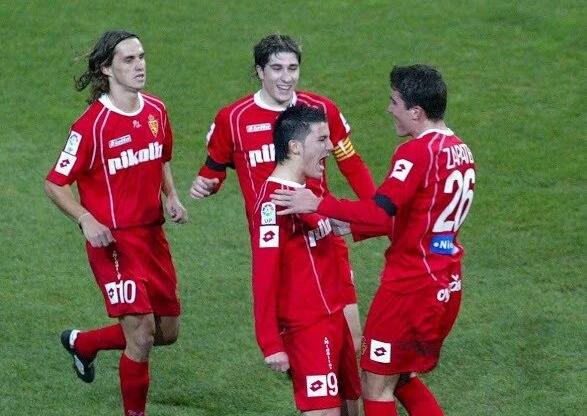 Sávio, Cani, David Villa y Alberto Zapater celebran un gol del 'Guaje' con el Real Zaragoza.