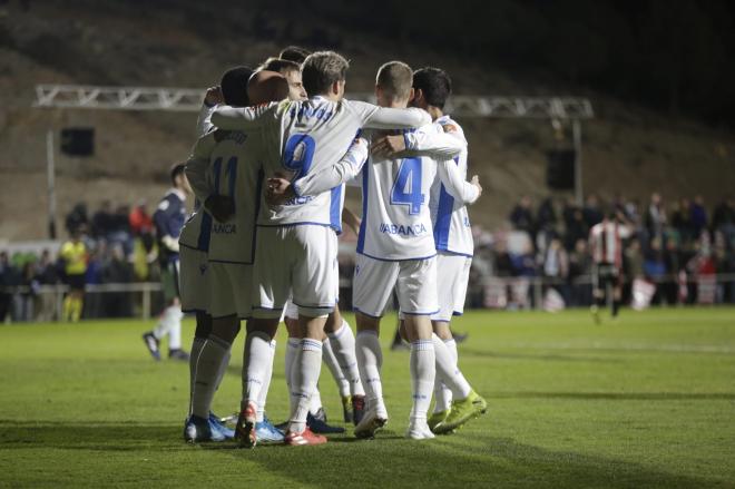 Los jugadores del Dépor celebran el gol de Longo (Foto: Dani Marzo).