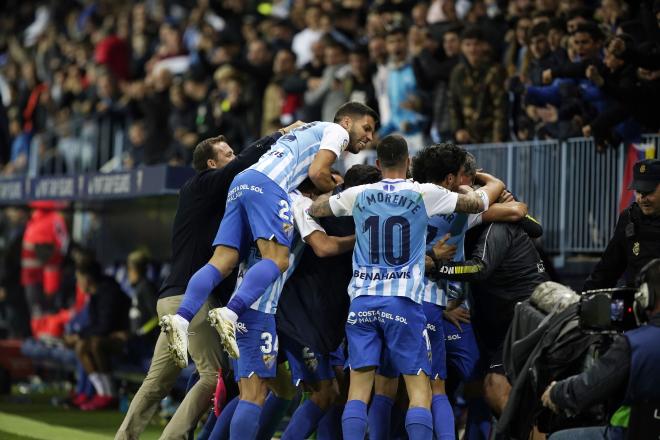 Celebración de un gol en La Rosaleda.