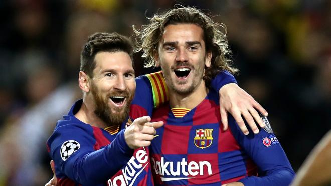 Leo Messi y Antoine Griezmann, cara y cruz en Comunio, celebran un gol con el Barcelona.