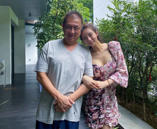 Peter Lim con su hija.