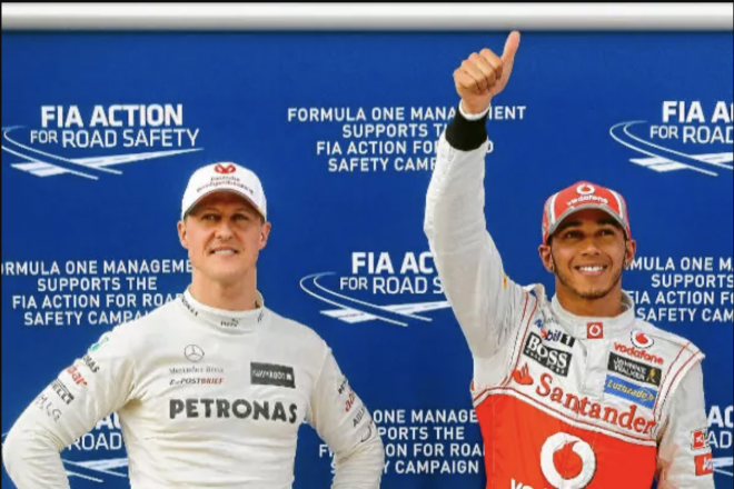 Michael Schumacher y Lewis Hamilton, en el GP de Malasia 2012 (Foto: EFE).