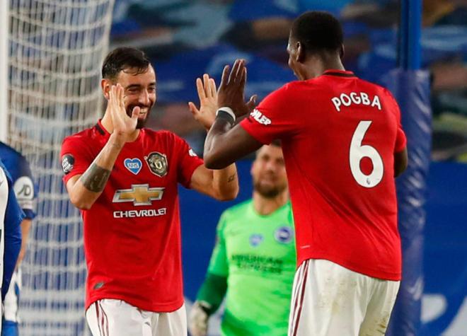 Pogba y Bruno Fernandes celebran un gol del Manchester United.