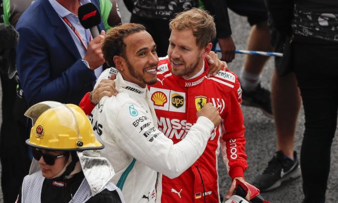 Lewis Hamilton y Sebastian Vettel, tras una carrera.