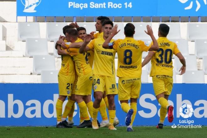 Los jugadores del Málaga celebran el 1-0 de Calero.