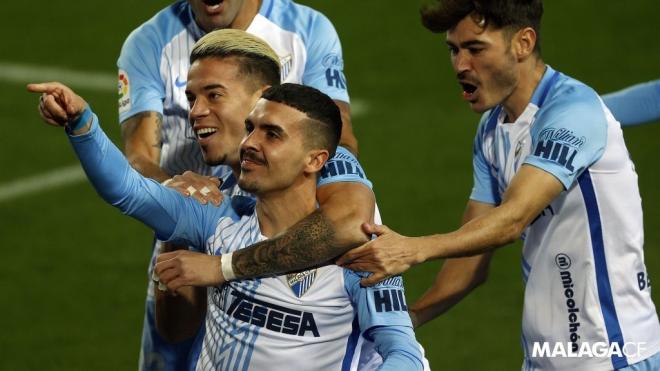 Joaquín Muñoz, celebrando con Josua y Jozabed su gol al Rayo (Foto: LaLiga).