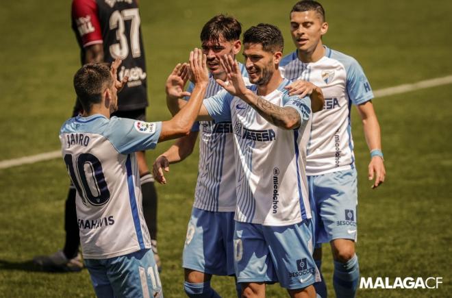 Jairo y Caye celebran el segundo gol al Albacete (Foto: Málaga CF).
