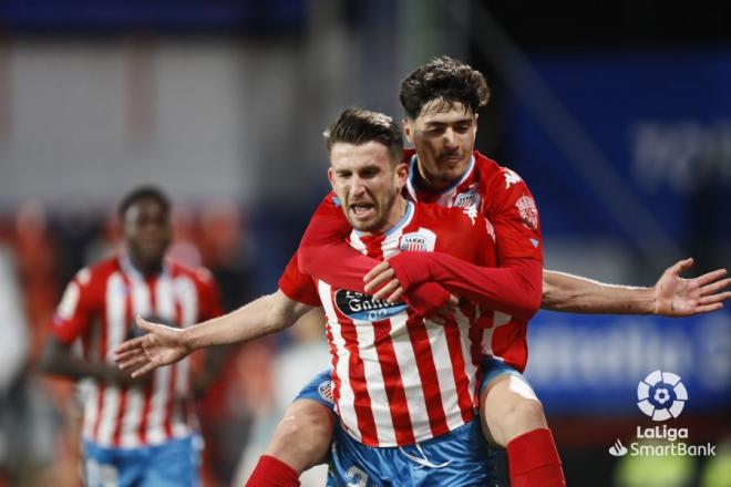 Los jugadores del Lugo celebran uno de los goles.