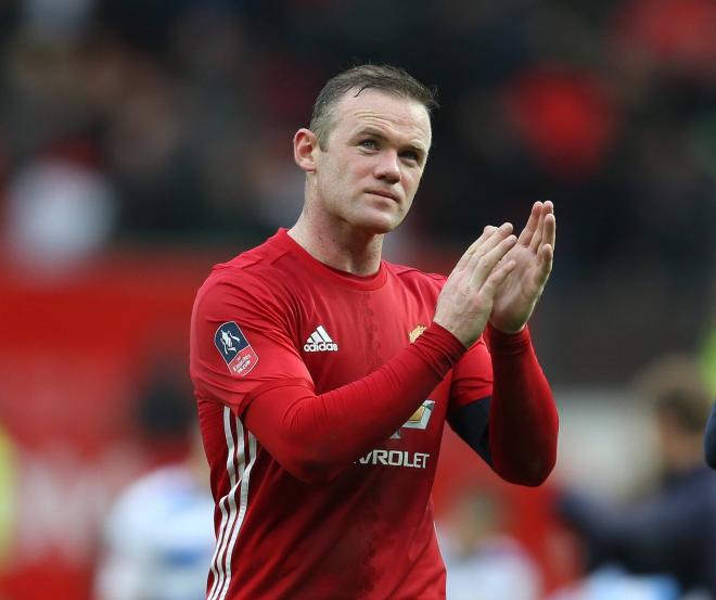Rooney, en un partido con el Manchester United (Foto: Cordon Press).