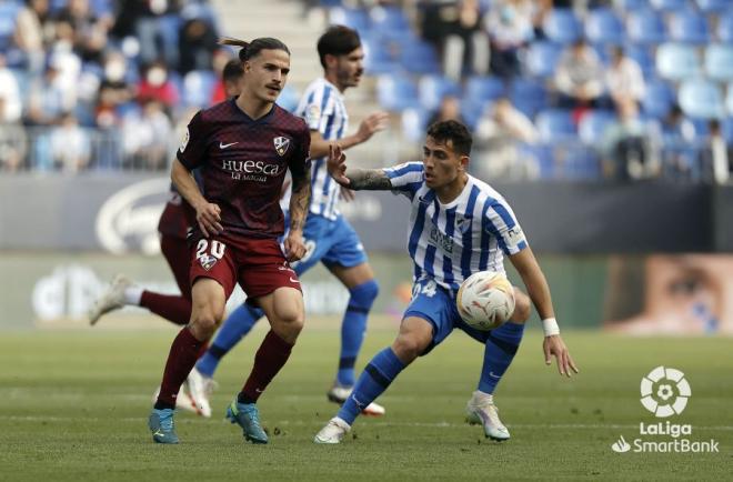 Cufré, en un lance del Málaga-Huesca (Foto: LaLiga).